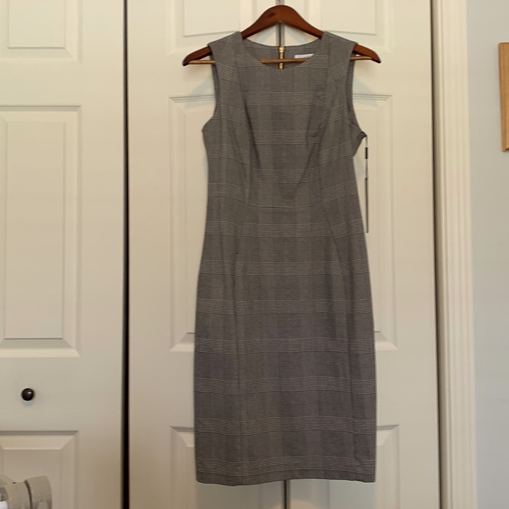 Brand New Calkin Klein sheath dress. Black and white Houndstooth pattern.